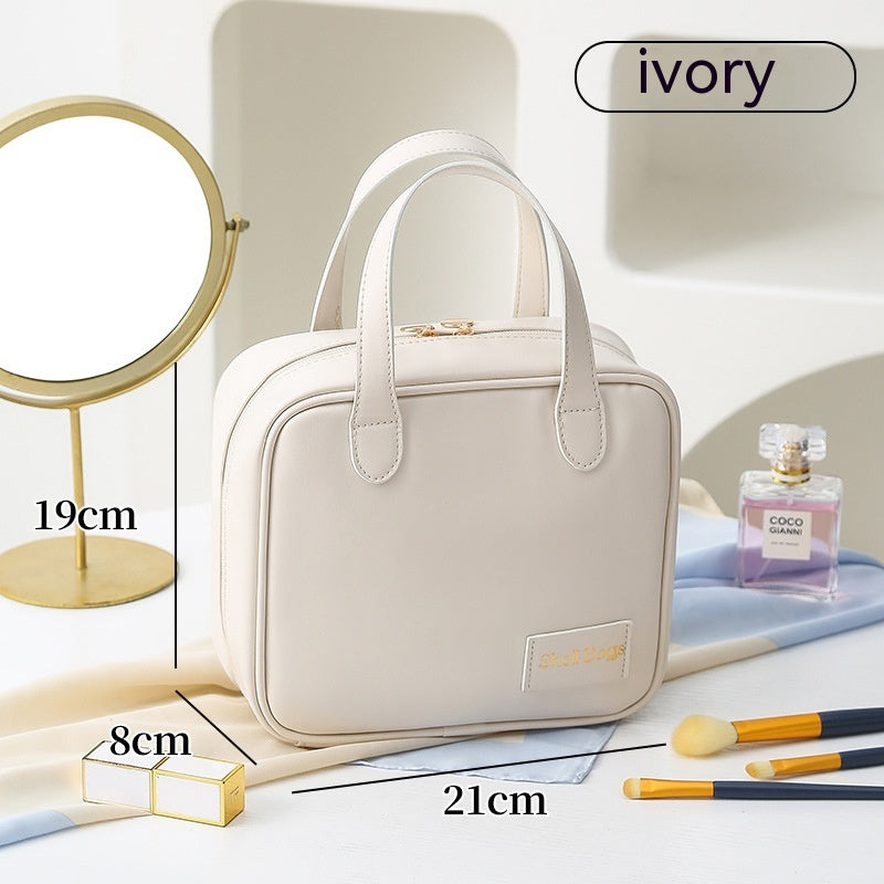 Ivory White wide-access travel pouch